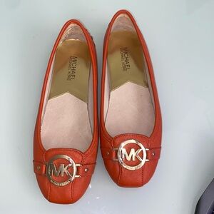 Unique Michael Kors orange and gold flats